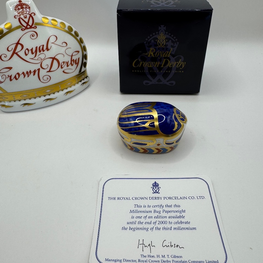 Royal Crown Derby "Millennium Bug" bone china paperweight 1999. Boxed with COA.